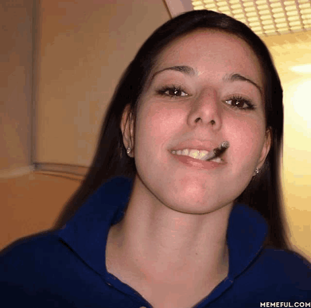 a woman smoking a cigarette with a memeful.com watermark on the bottom