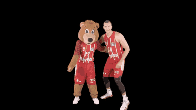a mascot and a basketball player are wearing jerseys that say bayer