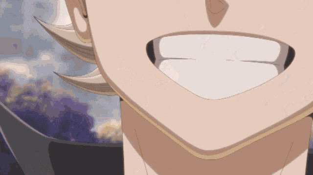 a close up of a person 's face with a smile on their face