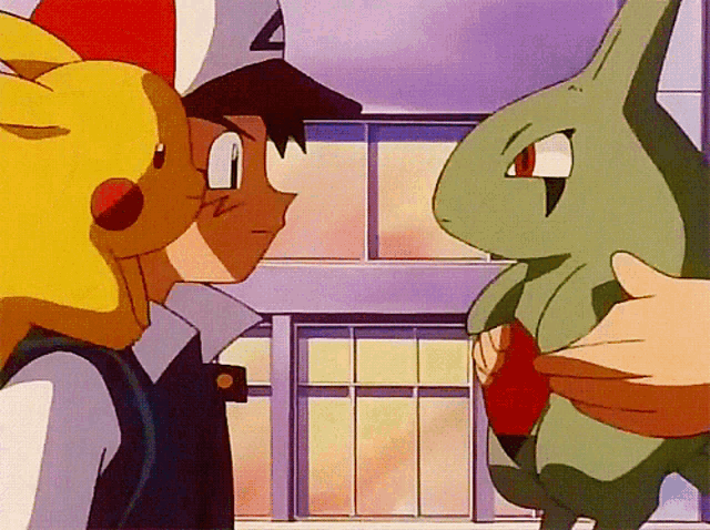 a cartoon character with the letter a on his hat is holding a rabbit