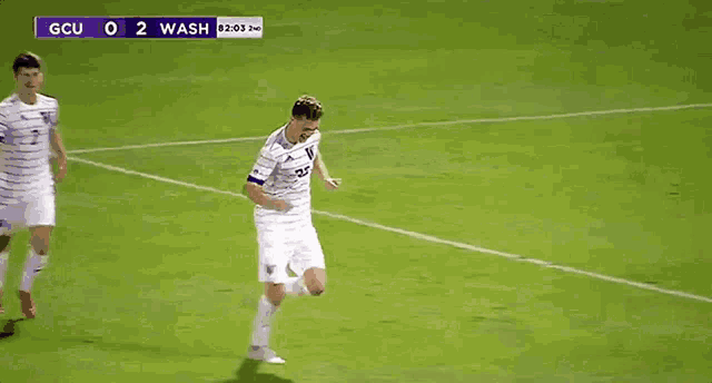 a soccer game is being played between gcu and wash