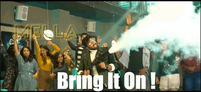 a group of people are dancing in a room with the words bring it on