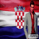 a man in a suit stands in front of a flag that says kapring