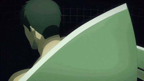 a man is taking a bath in a bathtub with a green blanket
