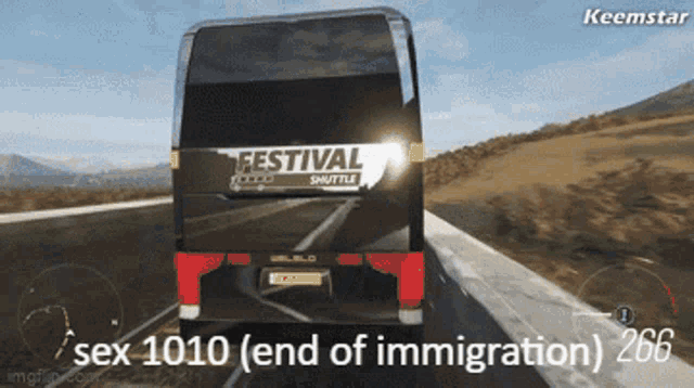 a festival shuttle bus driving down a road