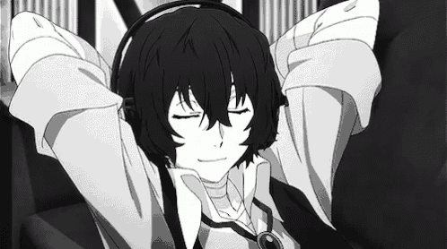 a black and white drawing of a boy wearing headphones and listening to music .