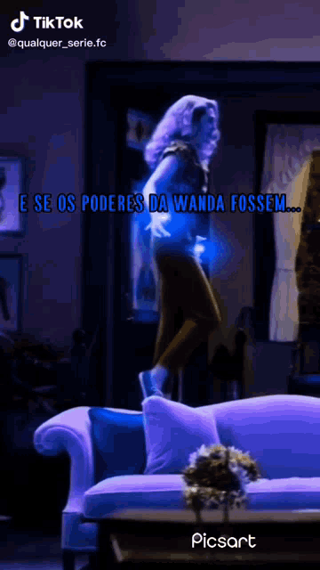 a tiktok video of a woman jumping over a purple couch