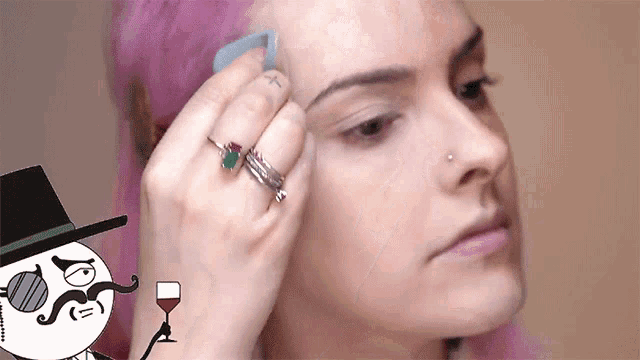 a woman with pink hair is getting her eyebrows shaped