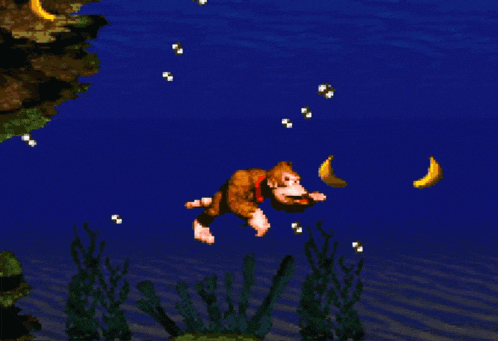 a video game character is swimming in the water with bananas