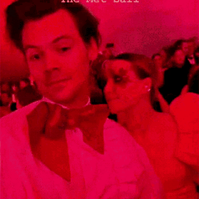 a blurred image of a man and a woman with the words " the hot date " on the bottom right