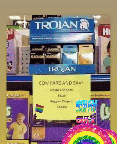 a display of trojan condoms and huggies diapers on a store shelf