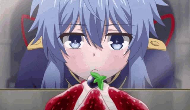 a girl with blue hair is eating a piece of cake