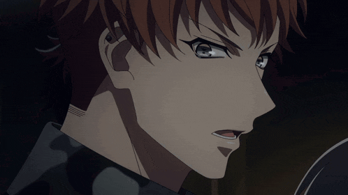 a close up of a man 's face with a very angry look on his face