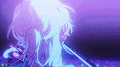 a close up of a person 's head with a blue light shining on it