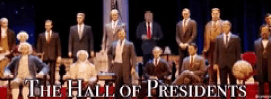a poster for the hall of presidents shows a group of statues of presidents