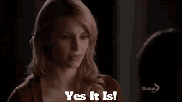 a woman says yes it is while talking to another person