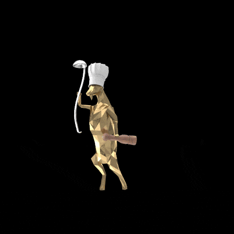 a statue of a dog with a chef 's hat on