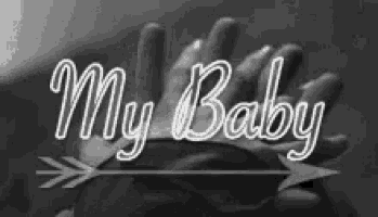a black and white photo of a person holding a baby 's hand with the words " my baby " on it
