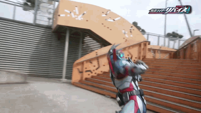 a robot is standing in front of a staircase with a clock on it