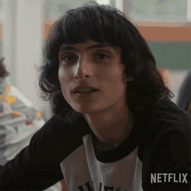a close up of a person 's face with netflix written on the bottom