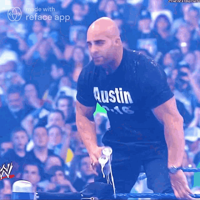 a man wearing an austin shirt is kneeling down