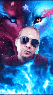 a man wearing sunglasses is standing in front of a painting of a wolf 's face