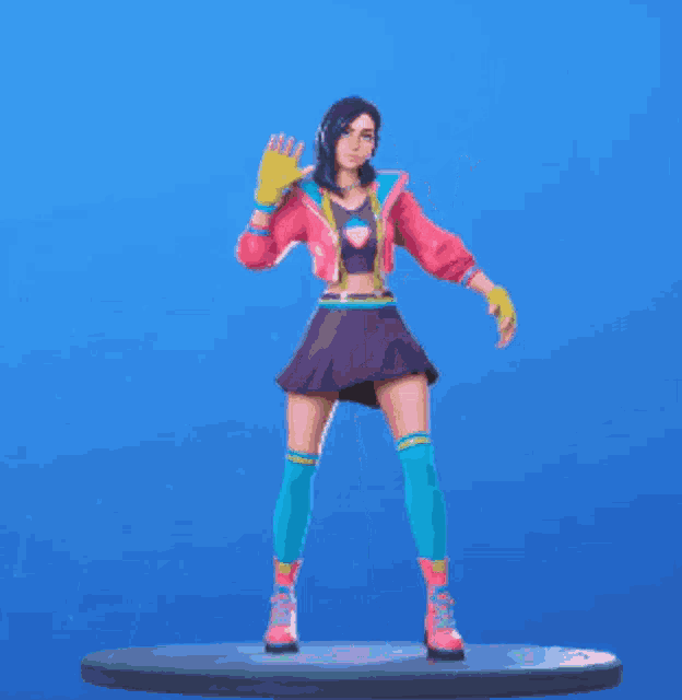 a woman in a pink jacket and purple skirt is standing on a podium .