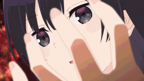 a close up of a girl with purple eyes covering her face