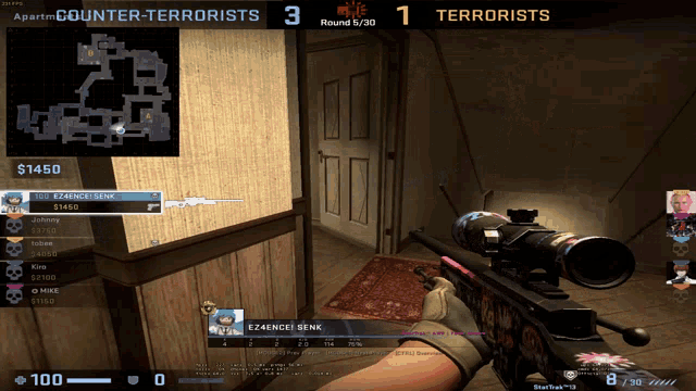 a person holding a sniper rifle in front of a screen that says counter terrorists