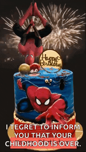 a spider man birthday cake with fireworks in the background