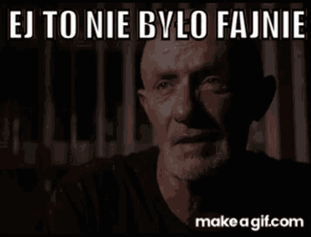 a man with a beard is crying in a dark room with a caption that says ej to nie było fajnie .