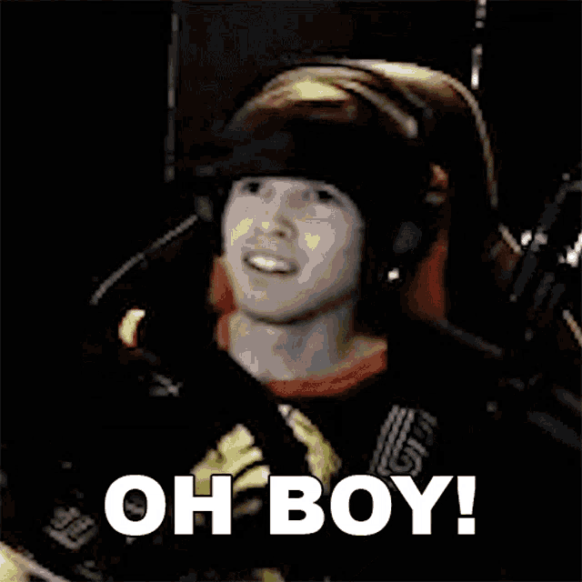 a man wearing headphones is making a funny face and says oh boy