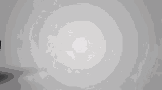 a black object is on a white surface