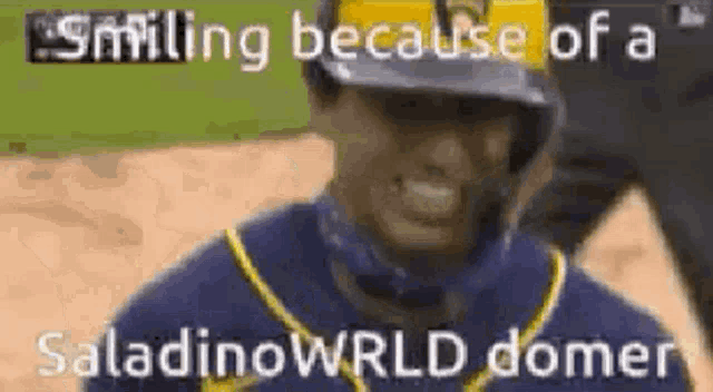 a man in a baseball uniform is smiling because of a saladinoworld domer .