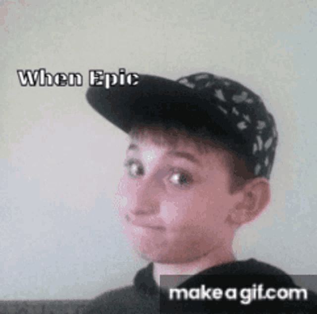 a boy wearing a hat with the words " when epic " written on it