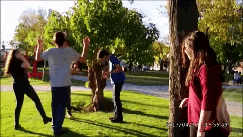 a group of people dancing in a park with the date of april 30th