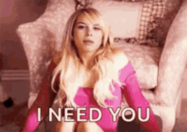 a woman is sitting in a chair and says `` i need you '' .