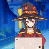 a girl wearing a witch hat is holding a laptop computer