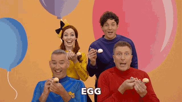 a group of people are holding eggs in their hands with the word egg above them