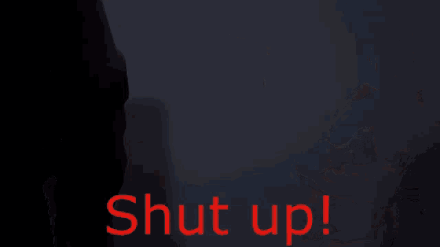 a gray background with the words shut up in red letters