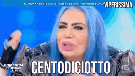 a woman with blue hair says centodiciotto on a screen