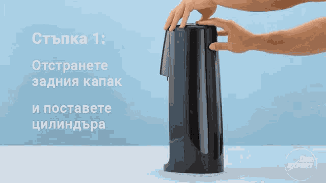 a person is holding a black object with a blue background and a digi expert logo in the corner