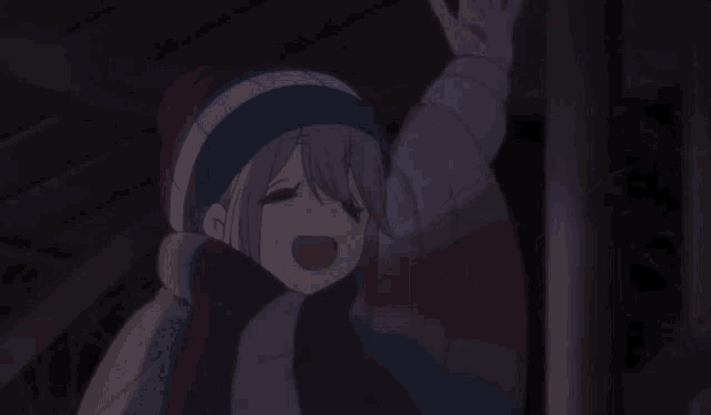 a girl with pink hair is wearing a striped jacket and a hat