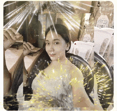 a woman is surrounded by chairs that say uoy ii