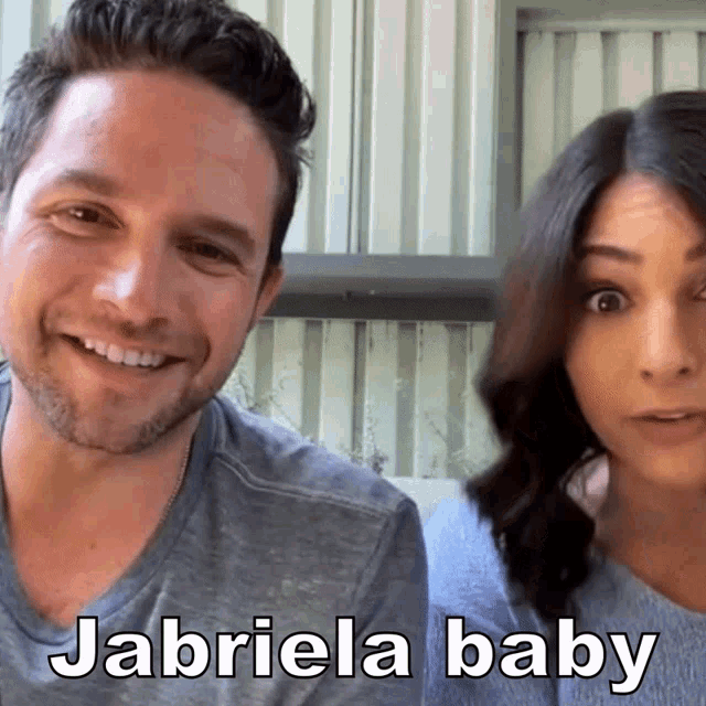 a man and a woman are smiling and the woman is named jabriela baby