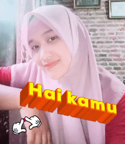 a woman wearing a hijab with the words hai kamu written in orange
