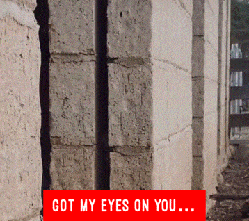 a brick wall with the words got my eyes on you below it