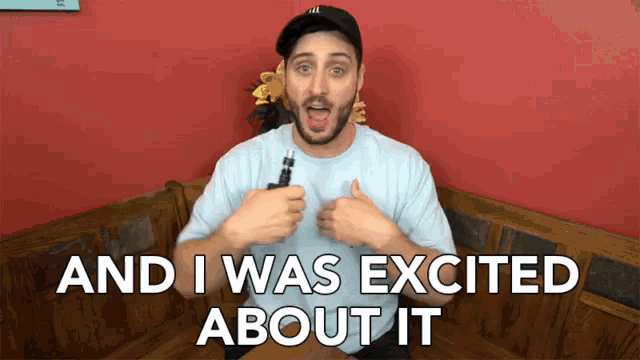 a man sitting on a bench with the words " and i was excited about it " behind him