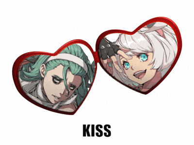 a couple of heart shaped mirrors with the word kiss underneath them