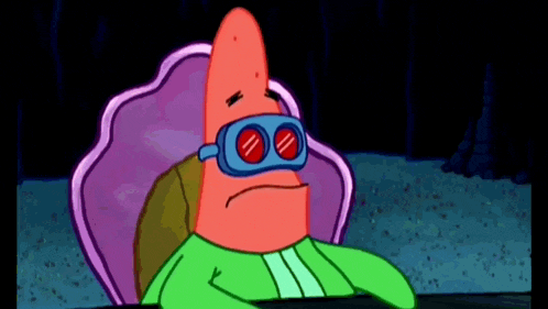 patrick star from spongebob is wearing a pair of goggles .